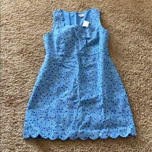 Gorgeous blue dress with scallop neck and bottom.